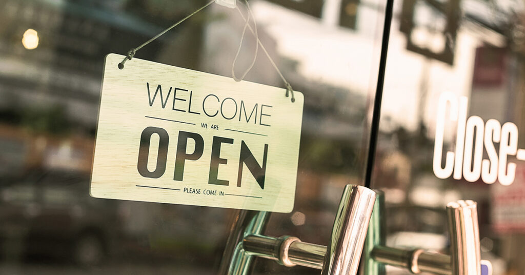 Image of an open sign in a window