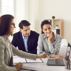 couple smiling with a professional